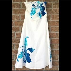 Strapless white dress with tropical blue flowers